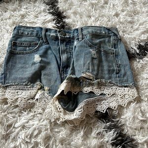 jean shorts with fabric at bottom